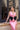 Vestido invitada rosa con broche