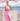 Mono Becka rosa con capote blanco