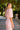 Vestido Elisabetta rosa salmón con guipur y mangas farol