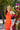 Vestido invitada naranja con lazada trasera
