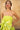 Vestido invitada verde con falda plisada