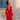 Vestido sofisticado rojo con detalles naturales