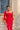 Vestido Selena rojo con plumas en puños